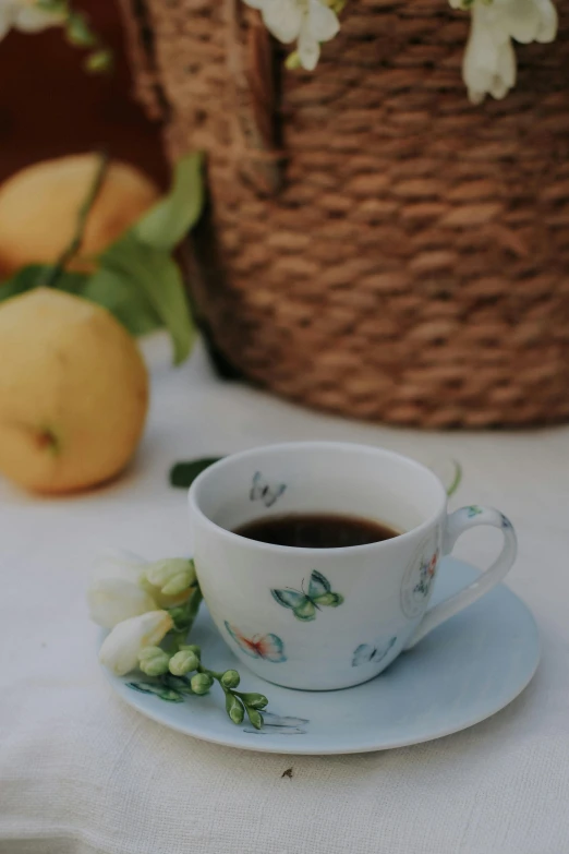 a small cup of coffee on top of a saucer