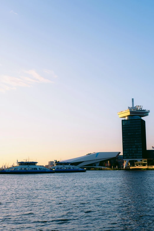 an airplane landing on the water near the dock