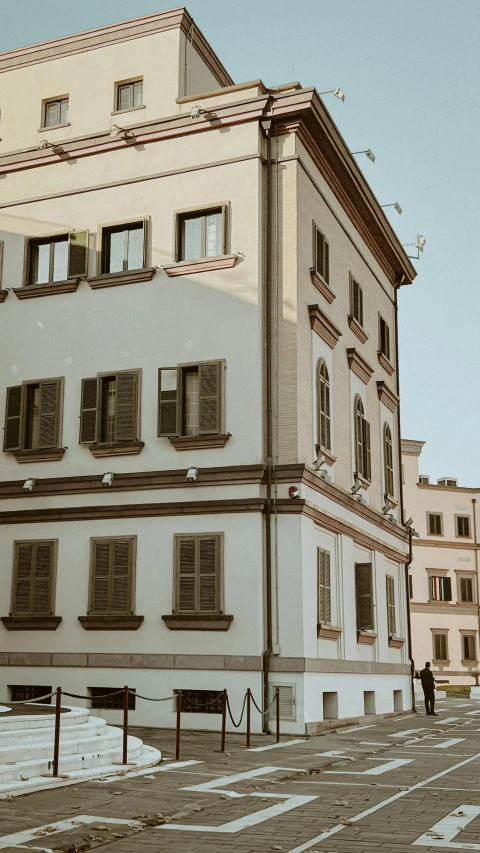 an old european style building with the sun shining through the windows