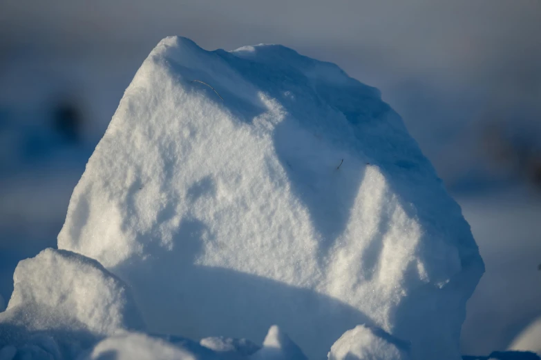 the snow is piled high on the ground