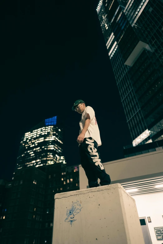 a man on a skate board going down a wall