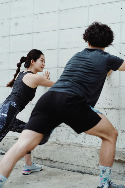 two people who are in the street doing soing