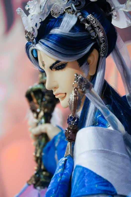 this figurine has an oriental style costume