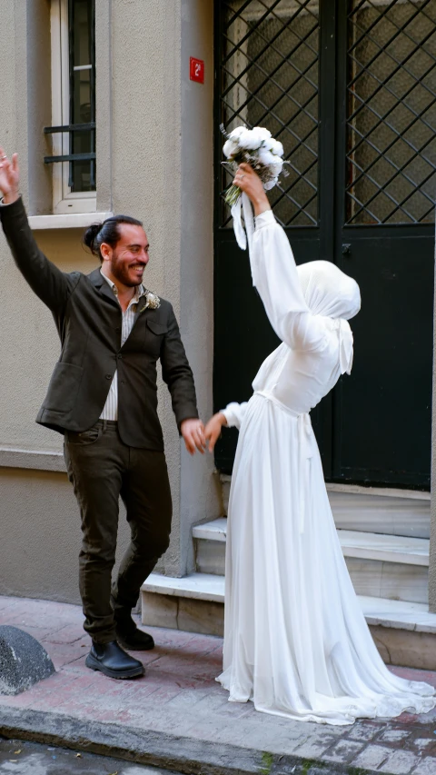 a newly married couple dressed in traditional irish attire