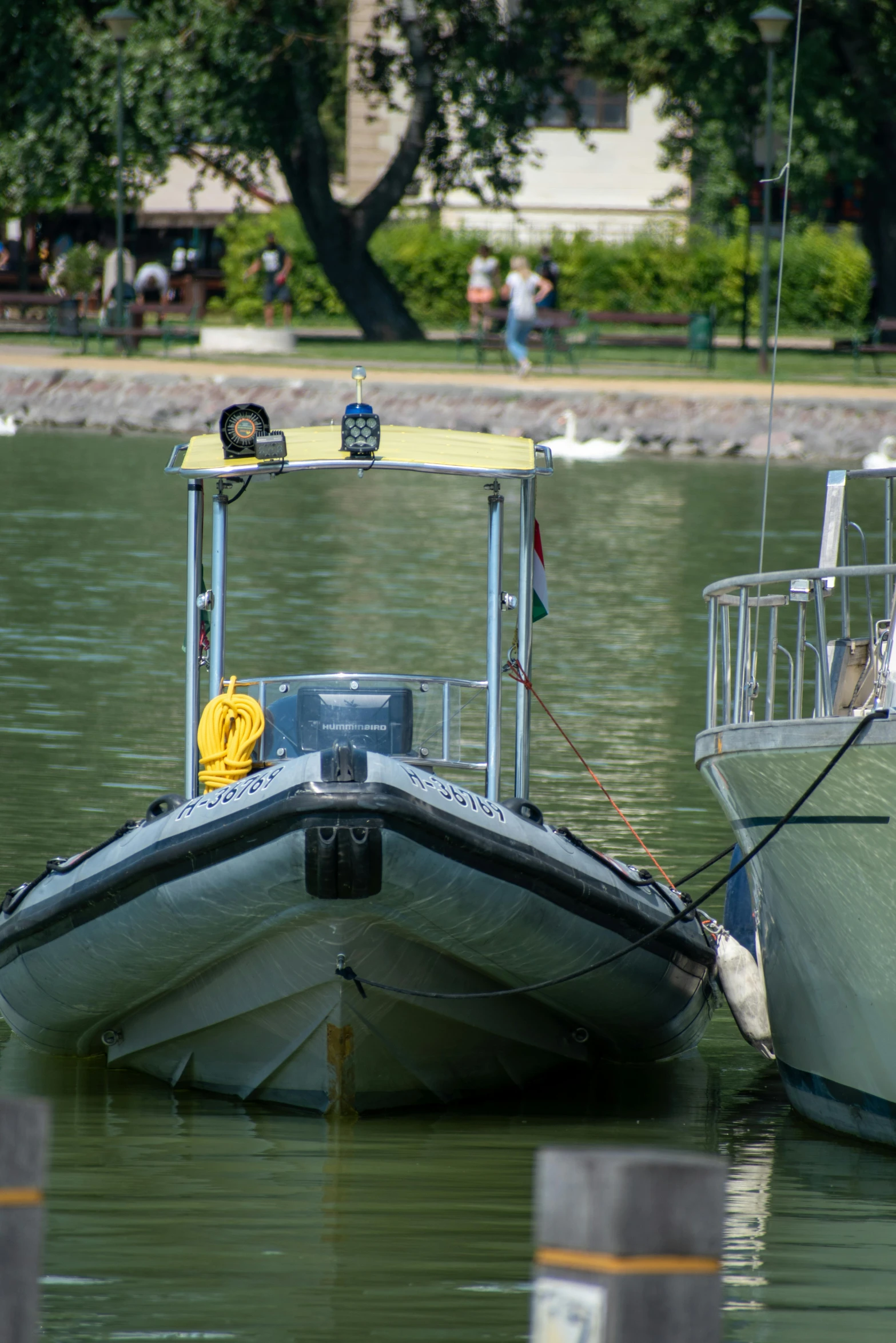 some small boats floating in a body of water