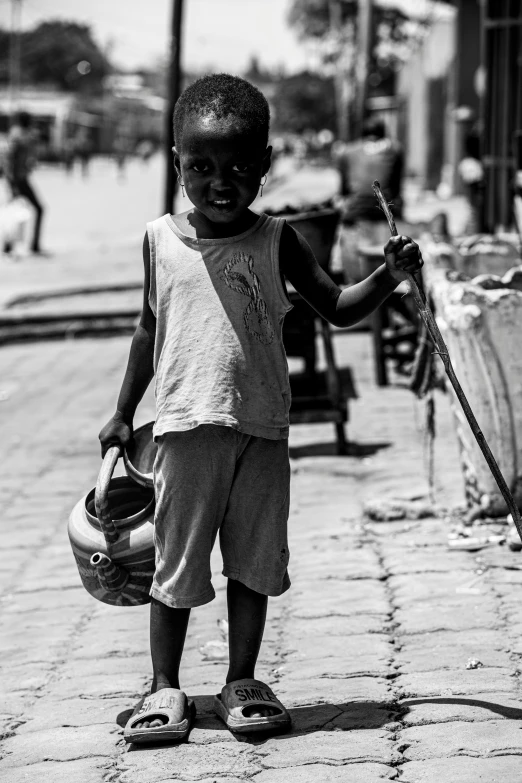  with bag walking on cobblestone road