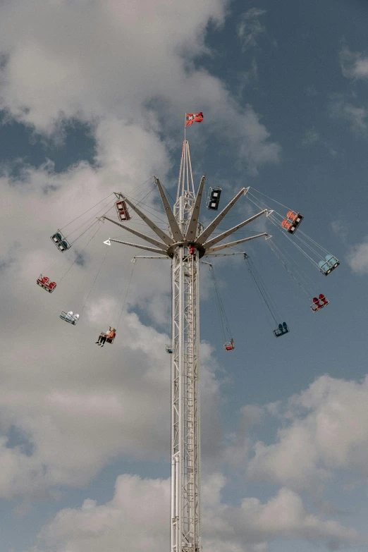 a big pole with different types of people on top