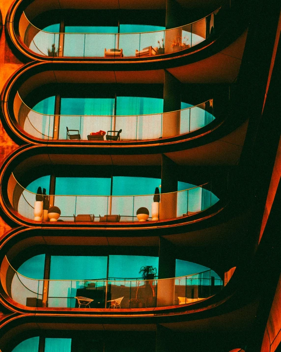 curved, blue glass windows overlook the street below