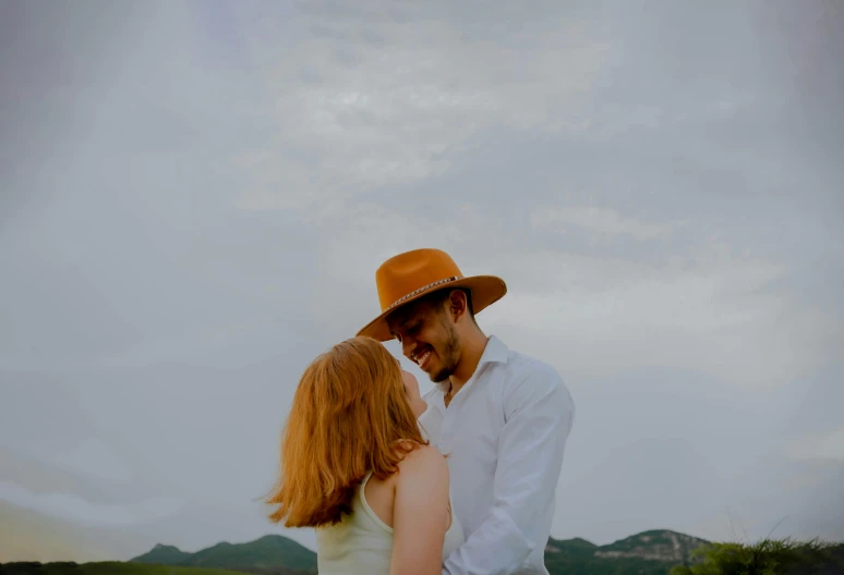 a close up of a person with a hat on