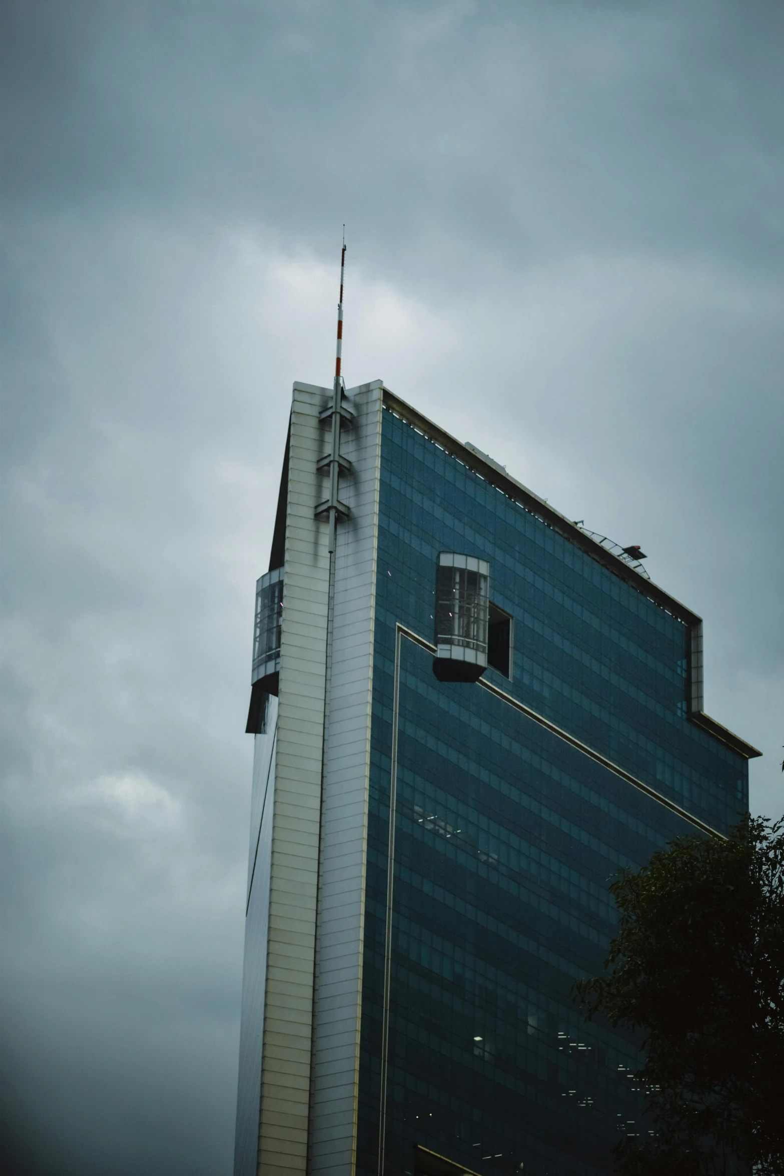 a clock tower and a sky scr on a dark, cloudy day