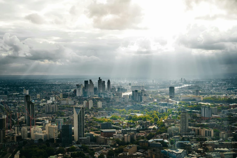 an aerial view shows an urban city in the background