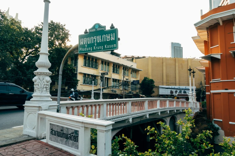 an outside view of a building with a street sign