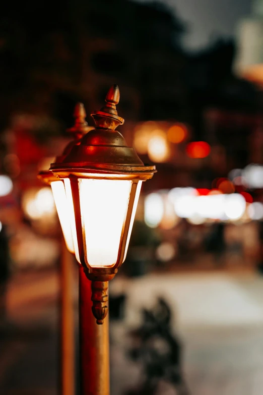 an empty street light with bright light in the background