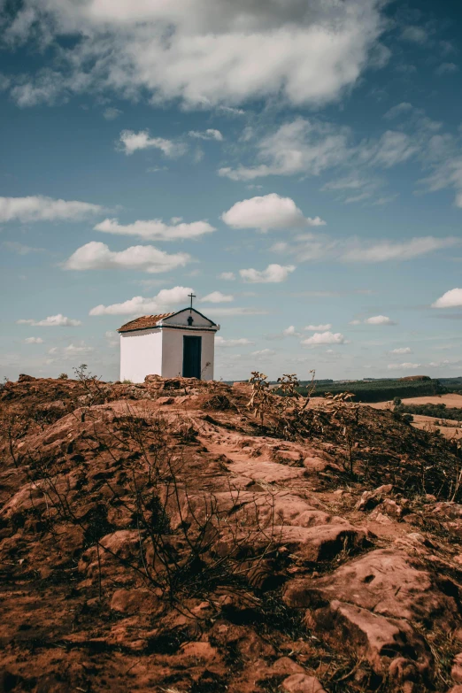 an outdoor structure sitting above some brown dirt