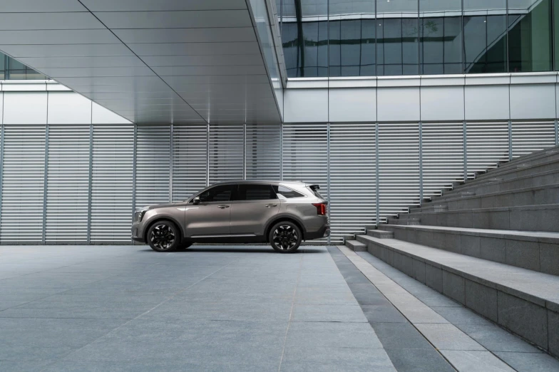 the suv is parked at the top of the set of stairs