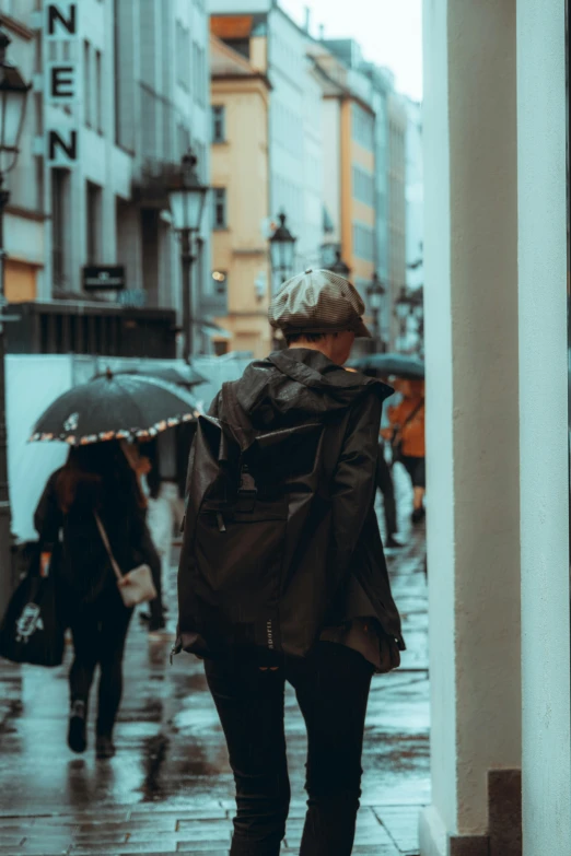 an old lady is walking with an umbrella