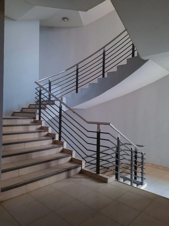 a view of an empty room with stairs