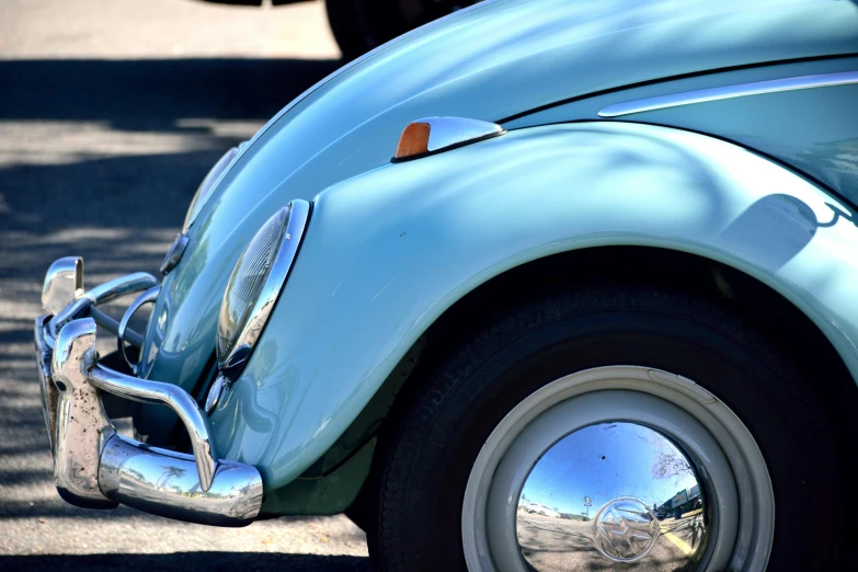 the chrome emblem of a blue beetle on the front