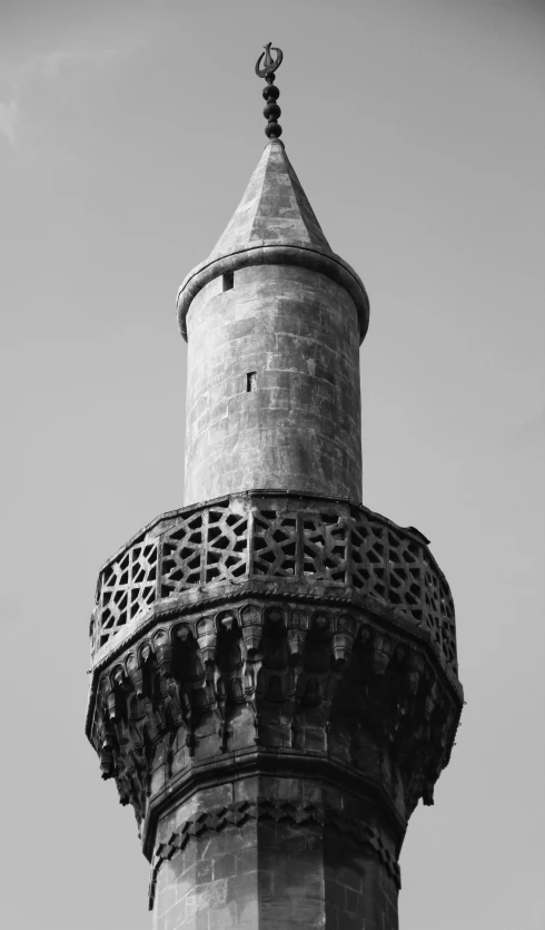 a brick structure with a cross and a cupola