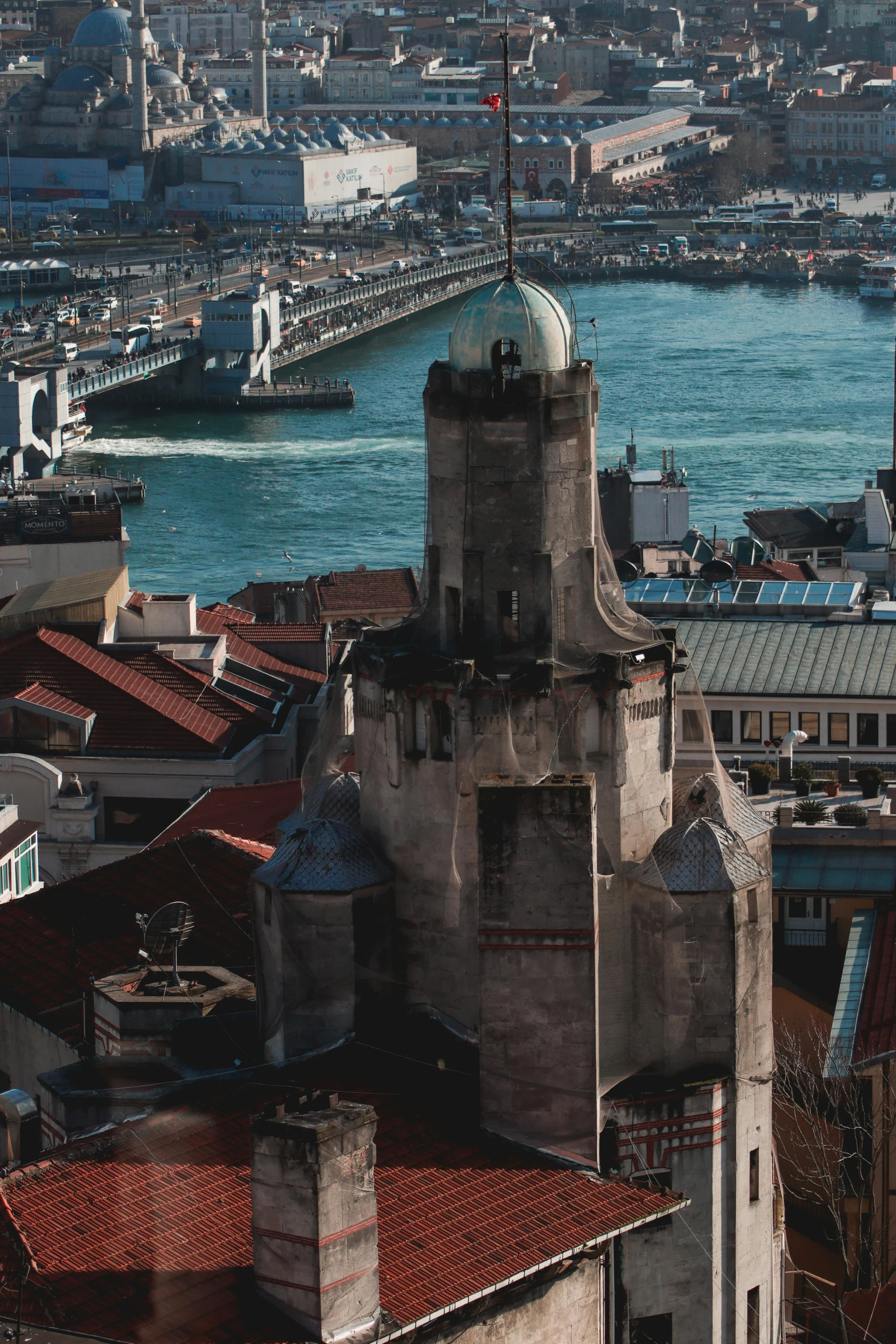 a city next to a harbor with many boats