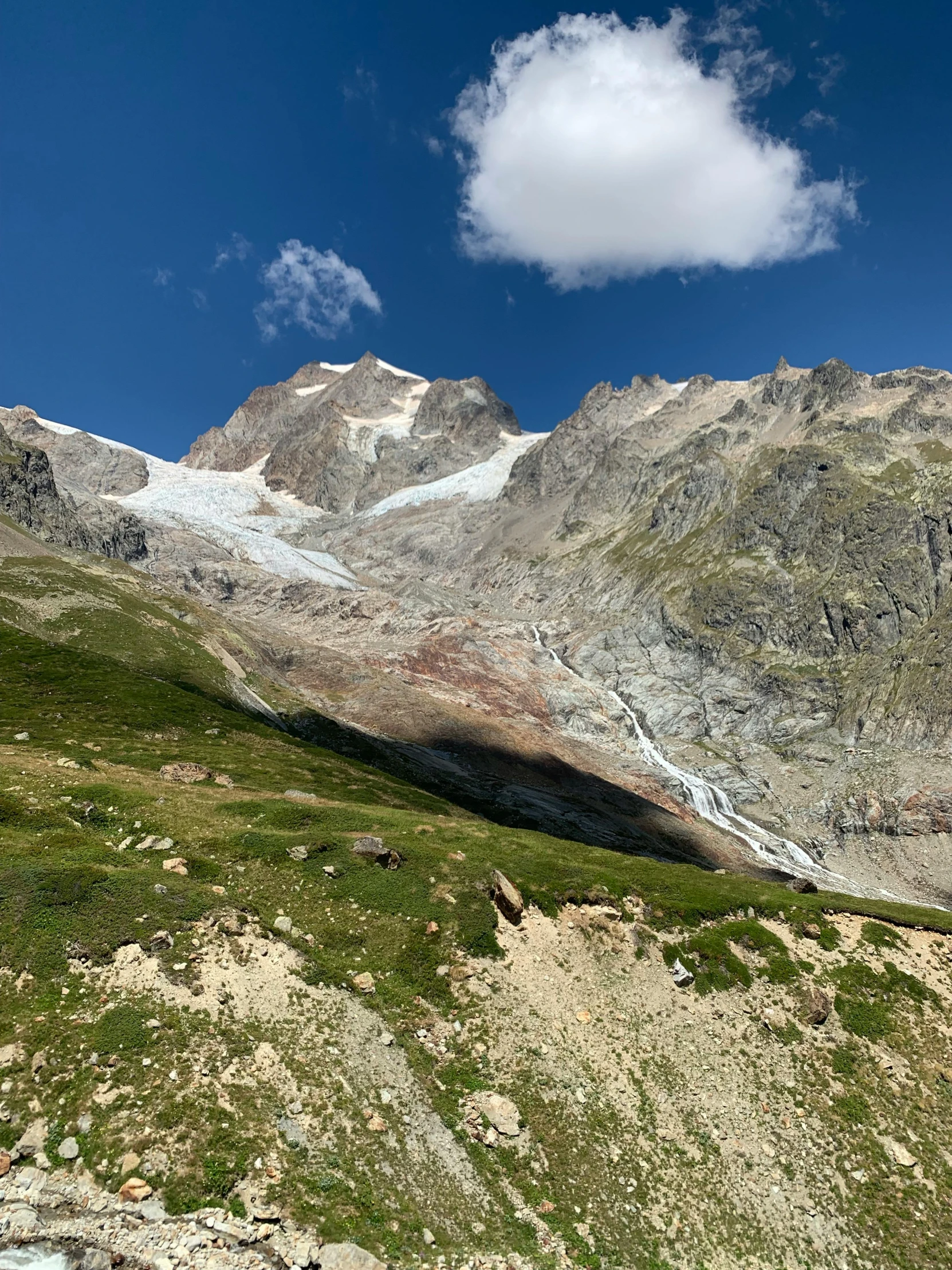 a very big pretty mountain with some snow