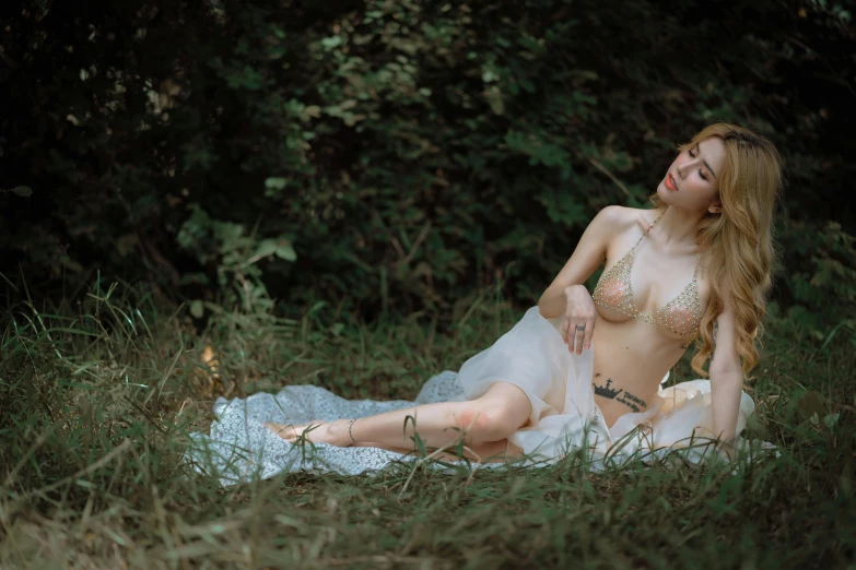 a women posing in a very  top and dress