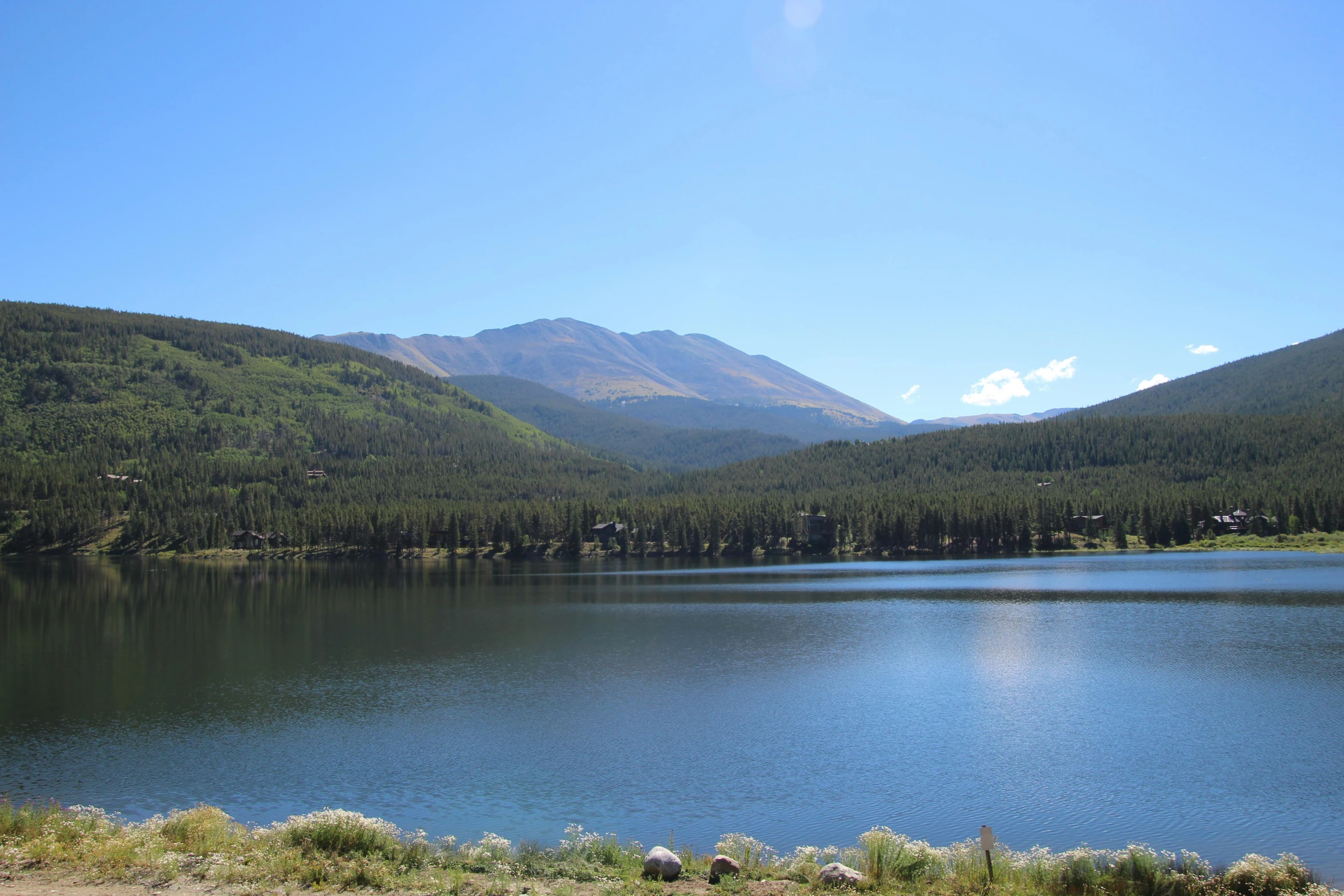 a lake with a mountain in the background