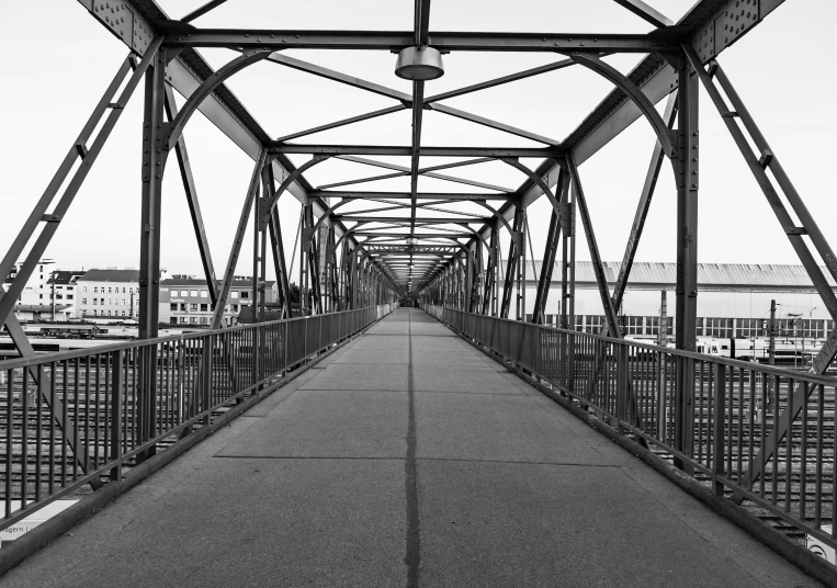 a black and white pograph of a bridge