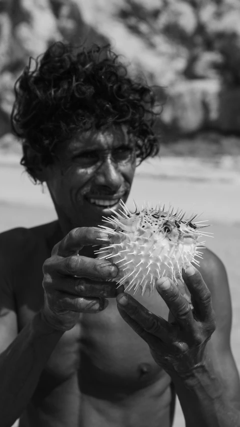 a man that is holding some kind of thing in his hands