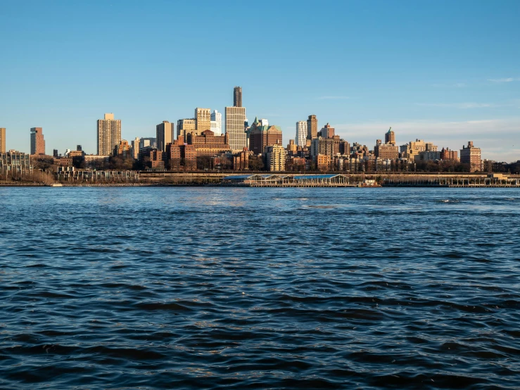 a view of the city from a bay in a large city