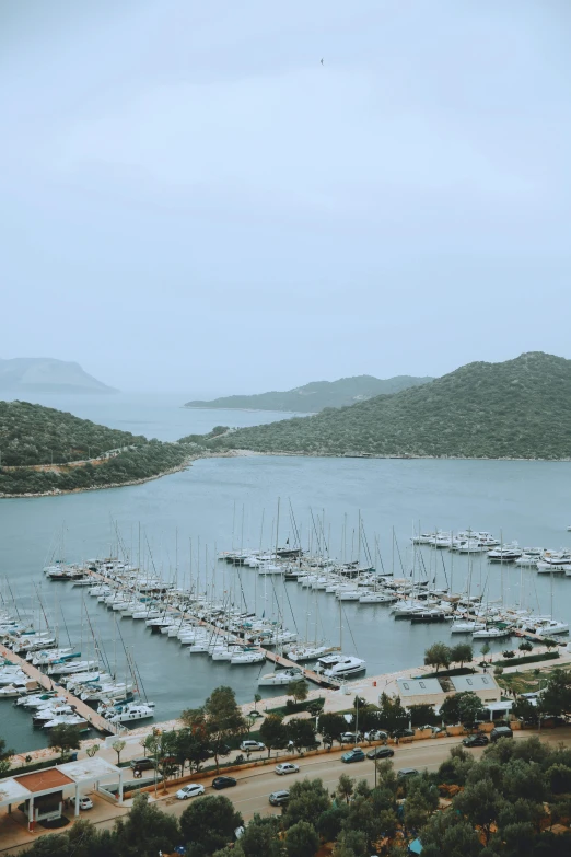 the view from the balcony of a el with many boats in the water