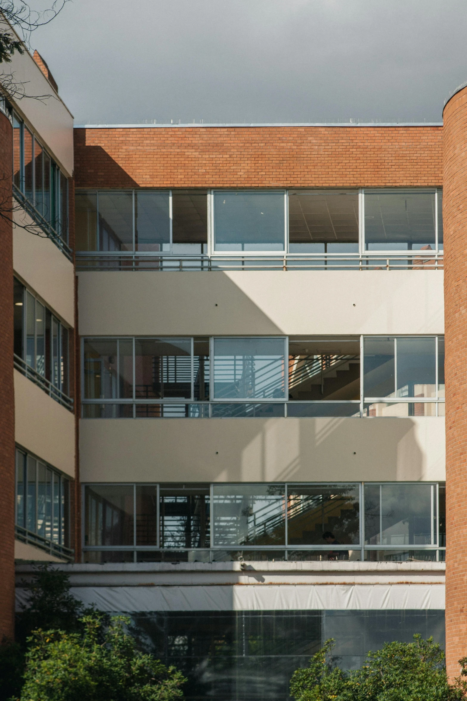 a modern brick and glass building in the uk