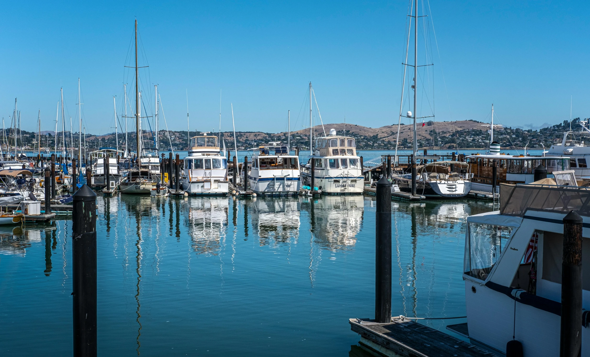 the harbor with several boats at the marina