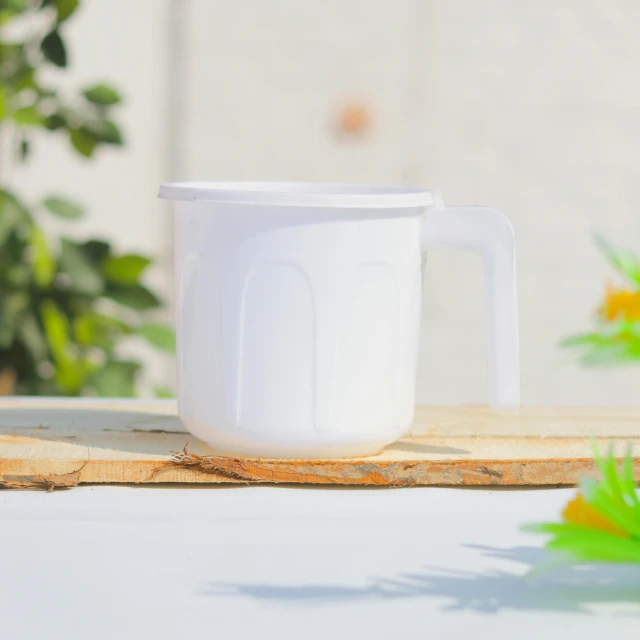 a coffee mug on top of a wooden table