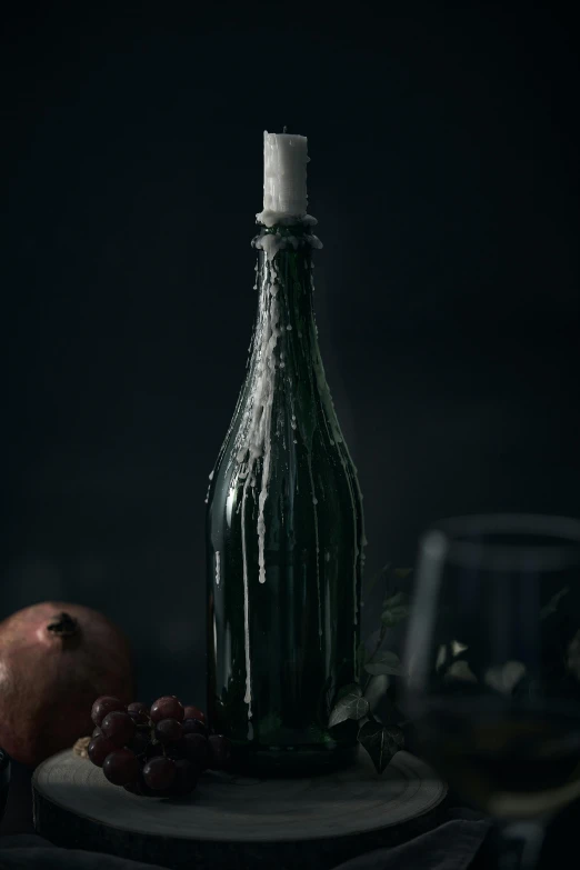 a bottle and a piece of fruit sitting on a table