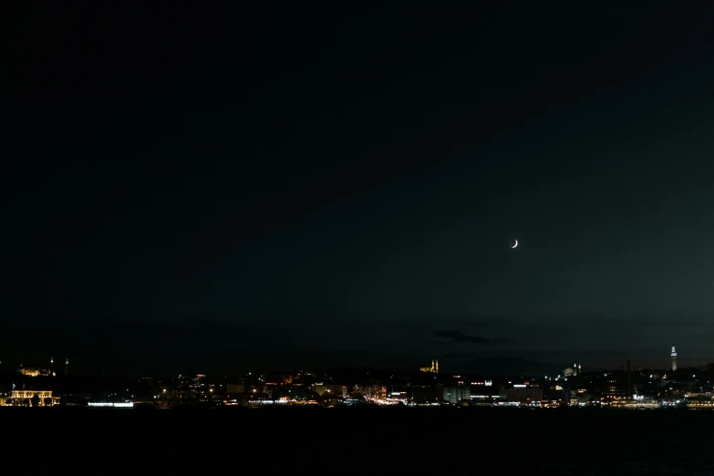 a cityscape seen through the night sky