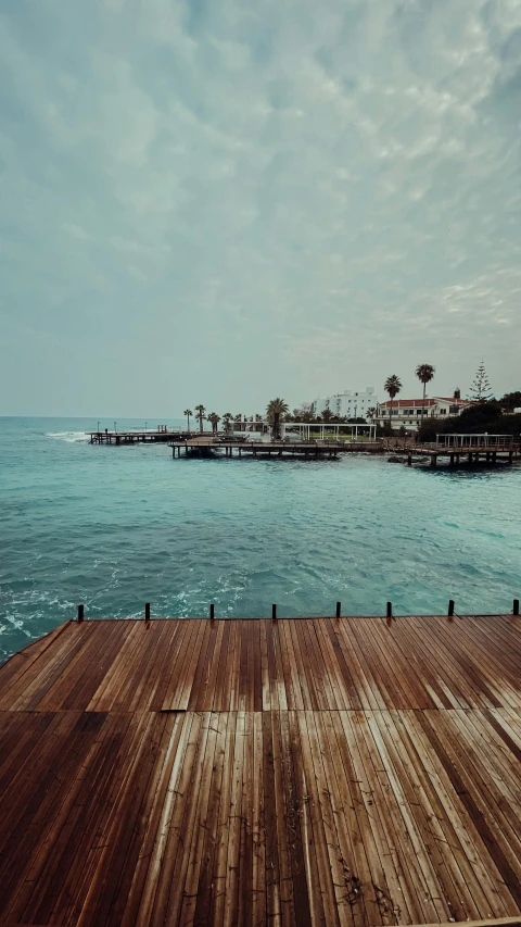 a pier stretching out into a body of water