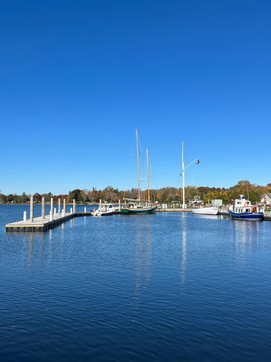 there is a lot of sailboats at the marina