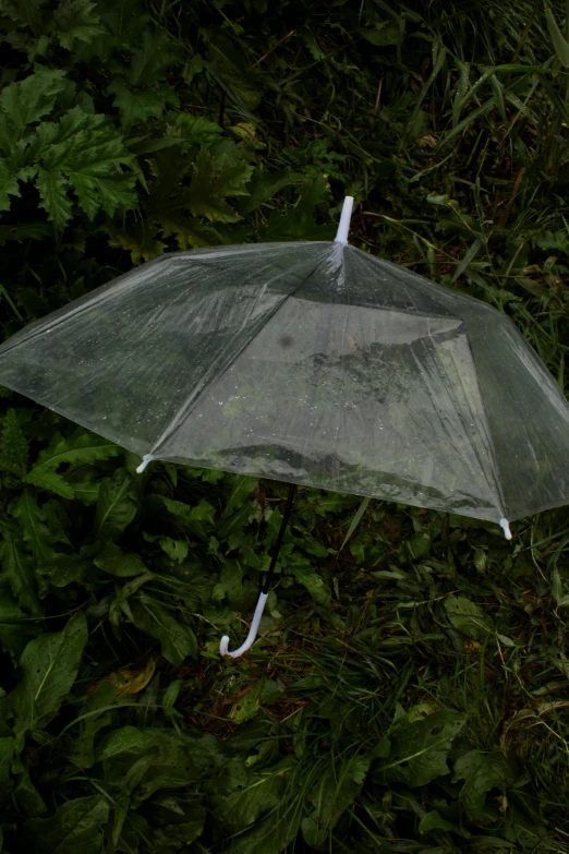 an umbrella that has been partially covered by plastic