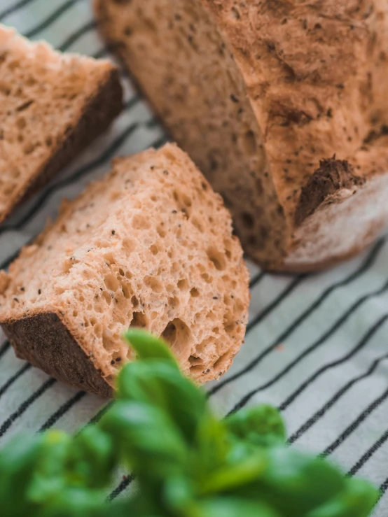 two loaves of bread that are half eaten