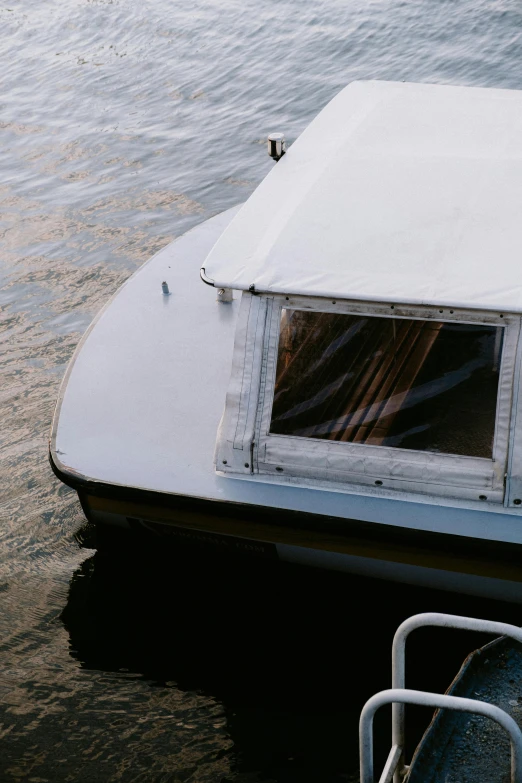 the boat is tied up to the pier