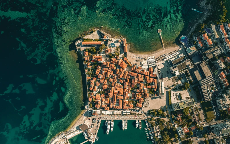 the aerial view shows a large building at sea