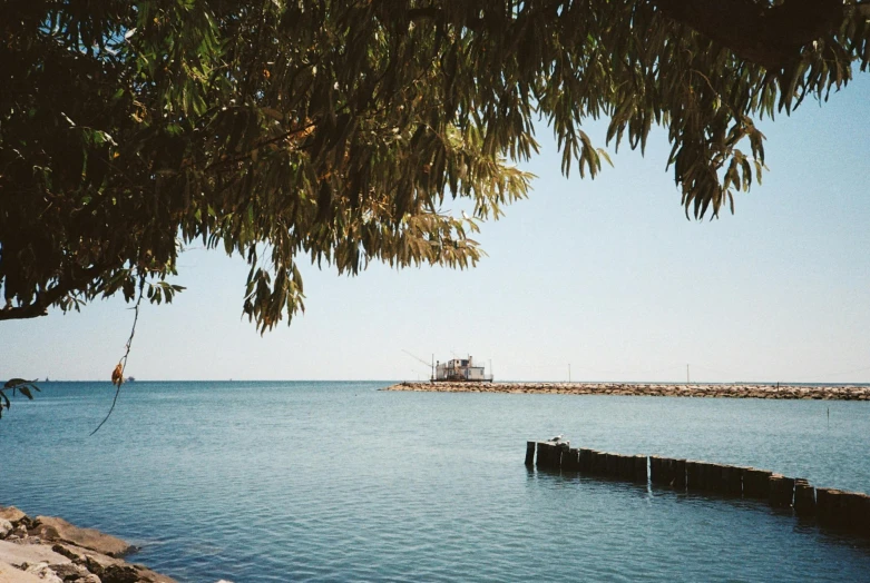 a view of the water in front of the pier