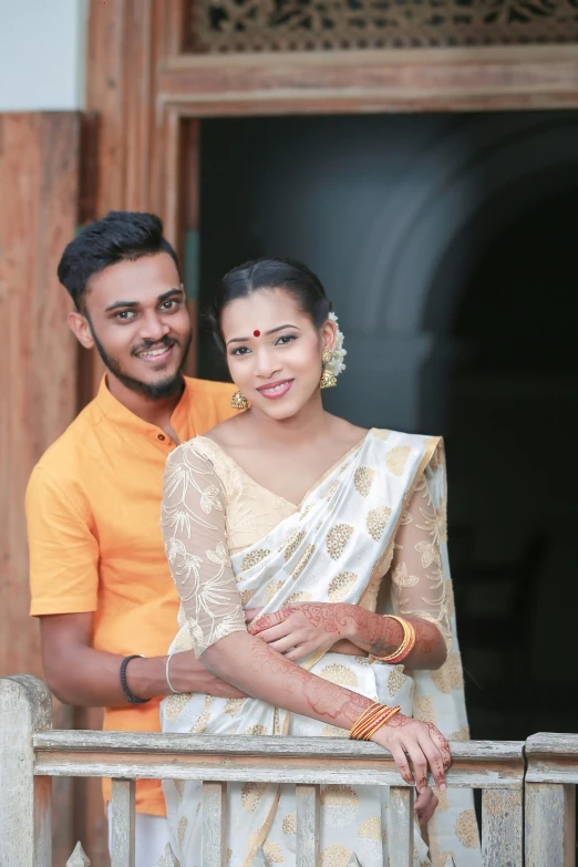 this is a couple posing in traditional garb