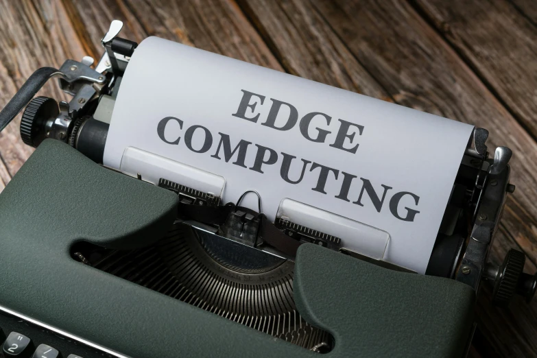 the word edge computing is written on an old fashioned typewriter