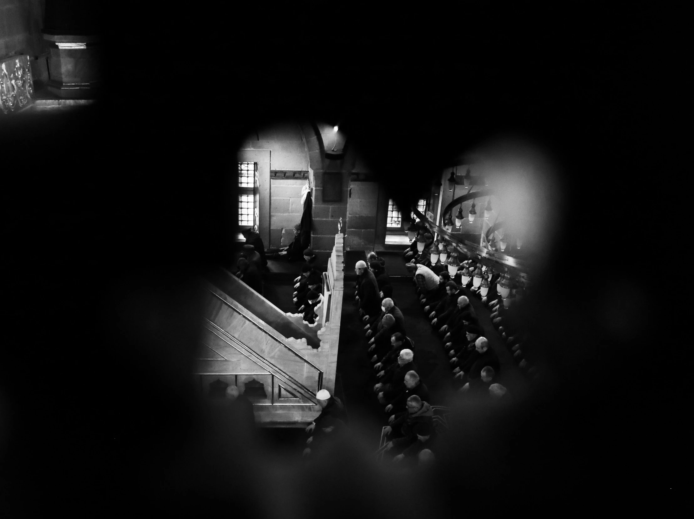 a black and white picture of an auditorium with auditorium seats