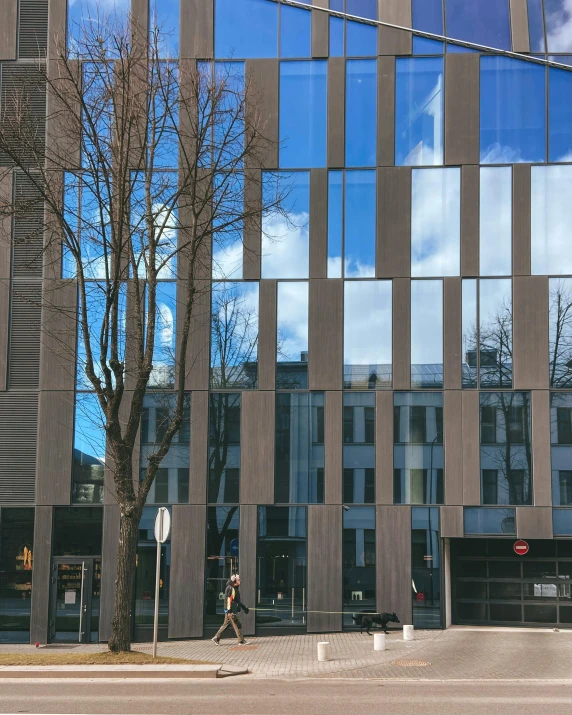 the building is designed with many squares and large windows