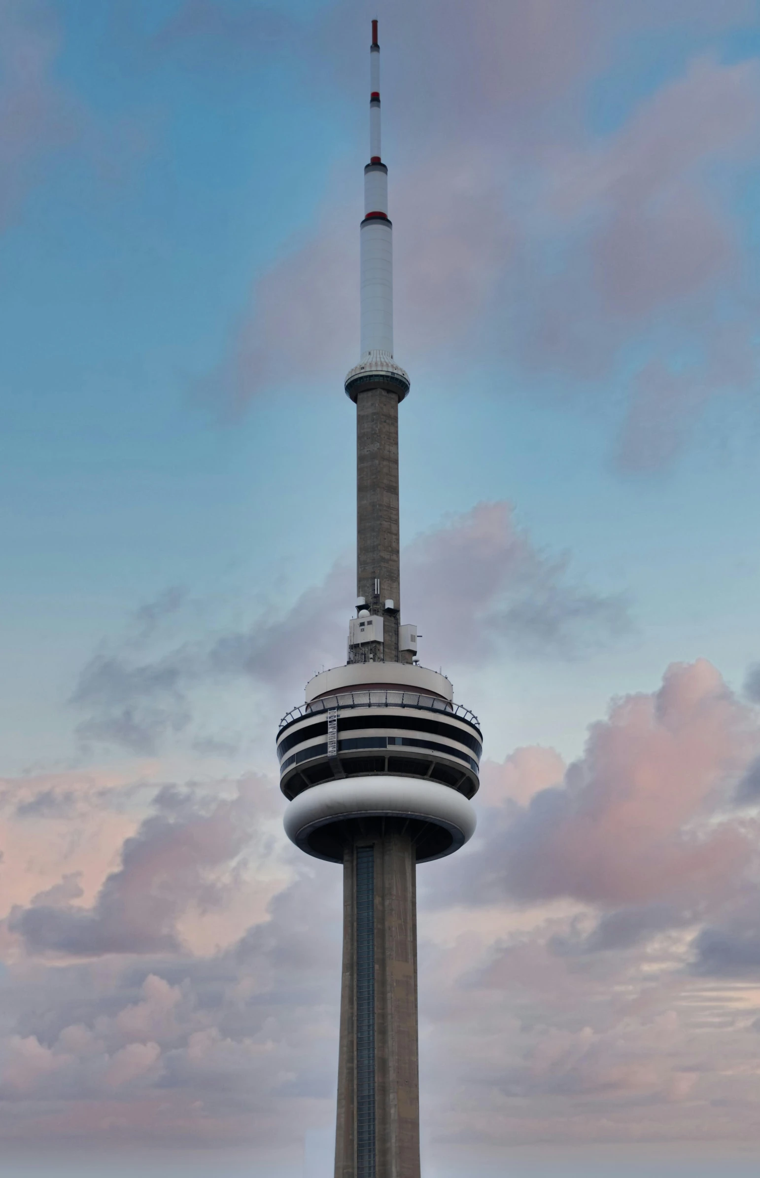 a view of the top of a tower at dusk