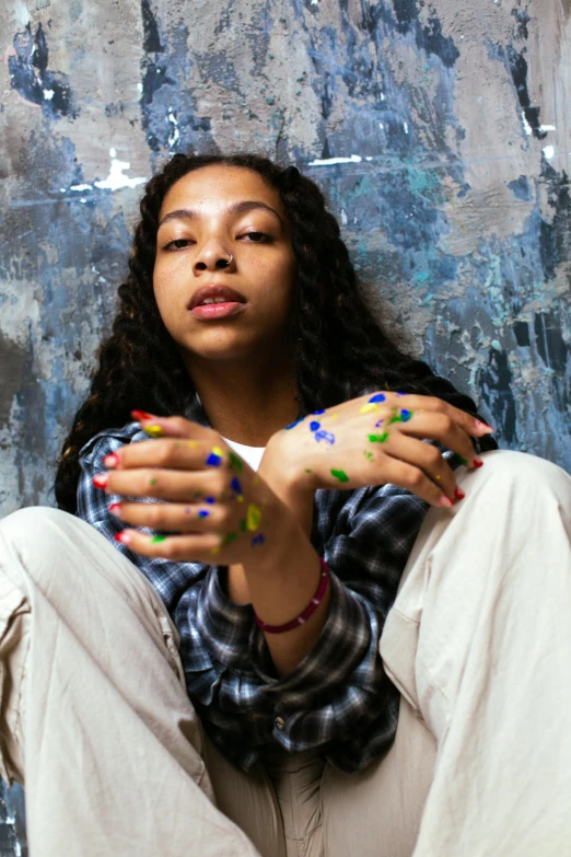 an image of a woman sitting and praying