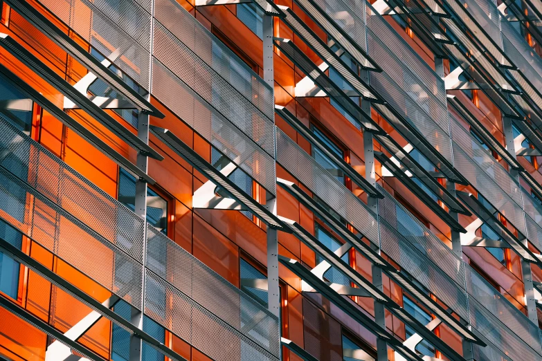 a picture of a building with orange and white metal lines